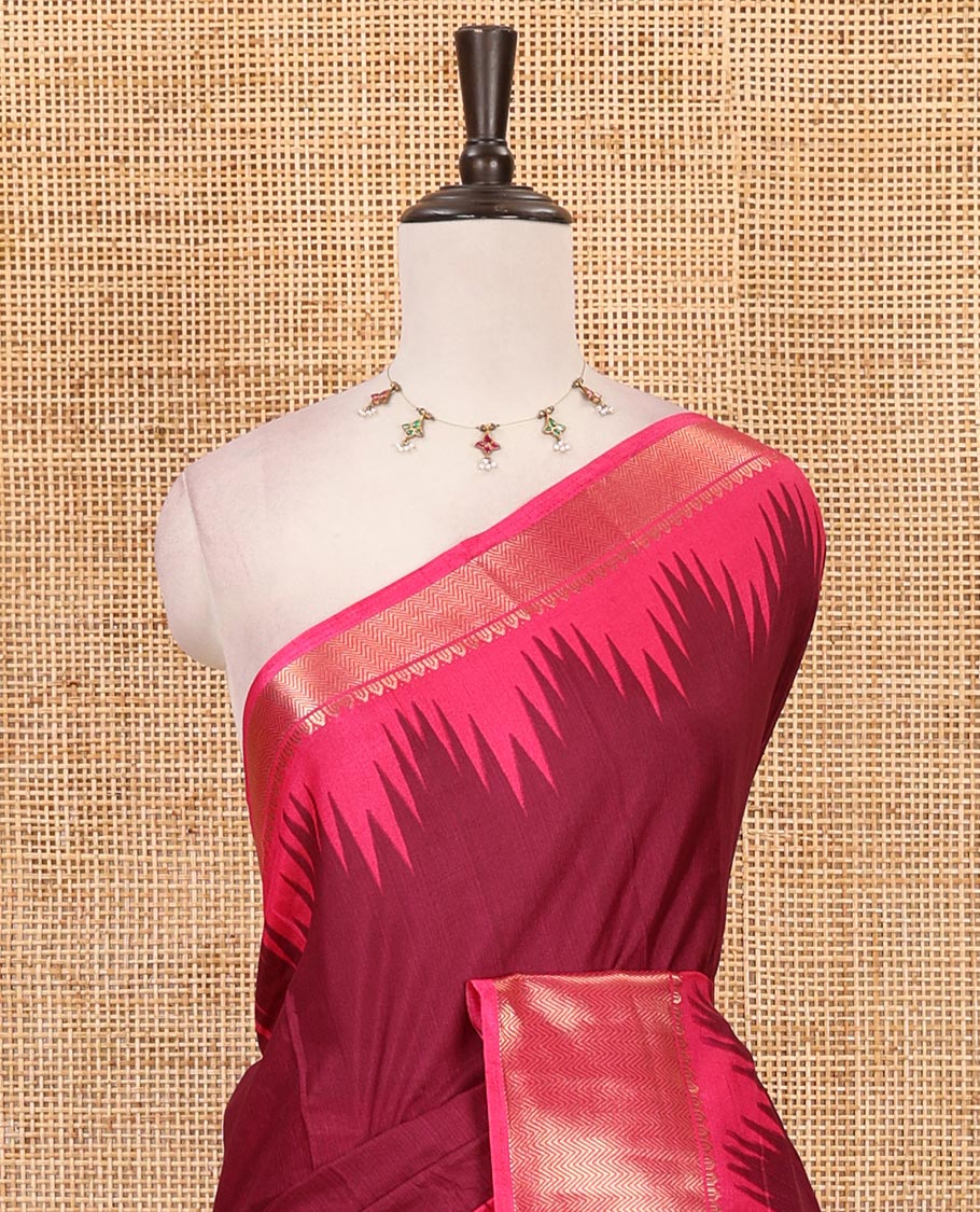 Maroon plain dola-tussar saree, contrast temple zari border, patola animal motifs enclosed jaal printed pallu & patola printed blouse