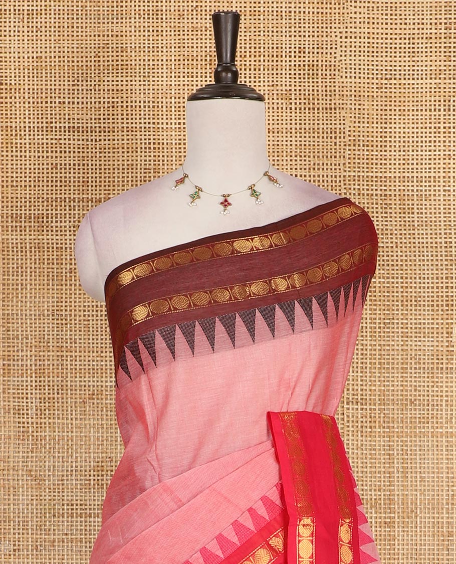 Candy pink plain Chettinad cotton saree, contrast zari rettai pettu temple border of rudraksham motifs, striped pallu and plain blouse