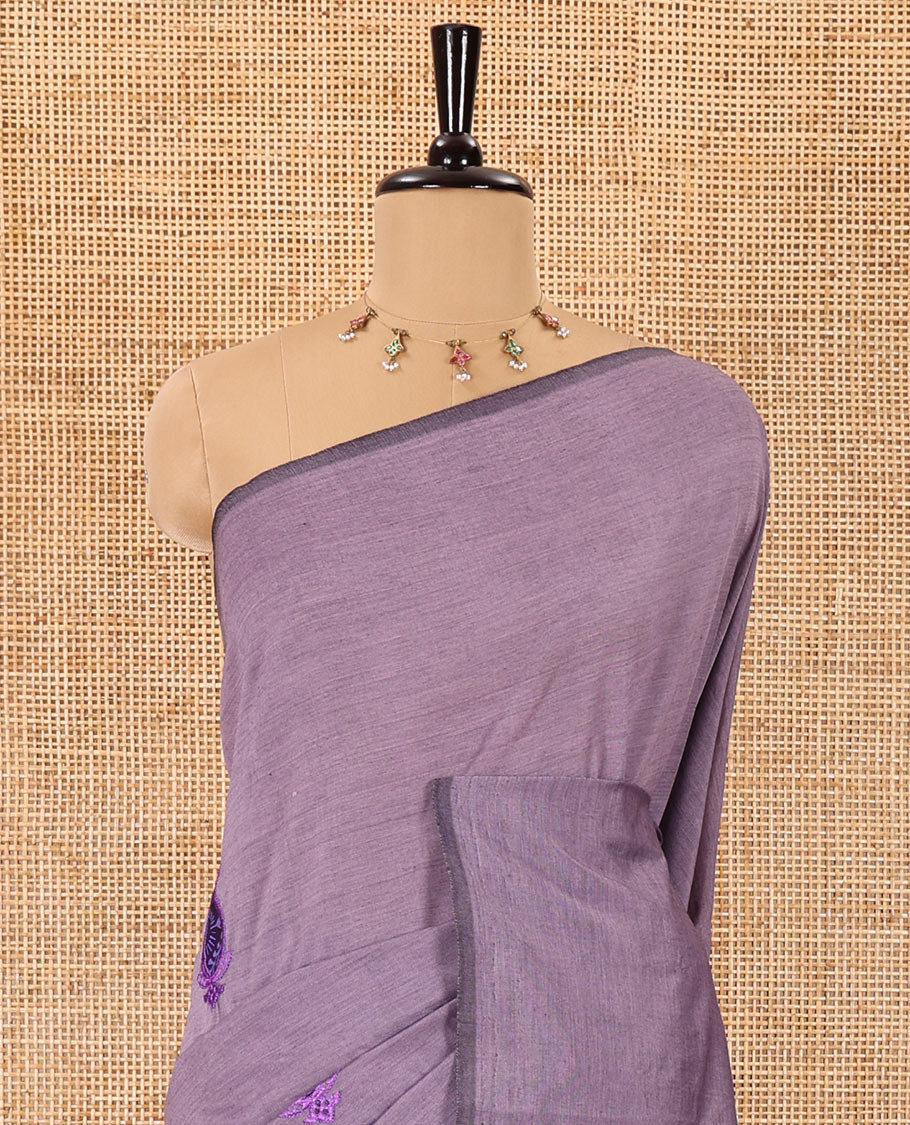 Borderless light lavender thilakam motifs patch embroidered South cotton saree with a plain blouse and a contrast ogee patterns printed blouse