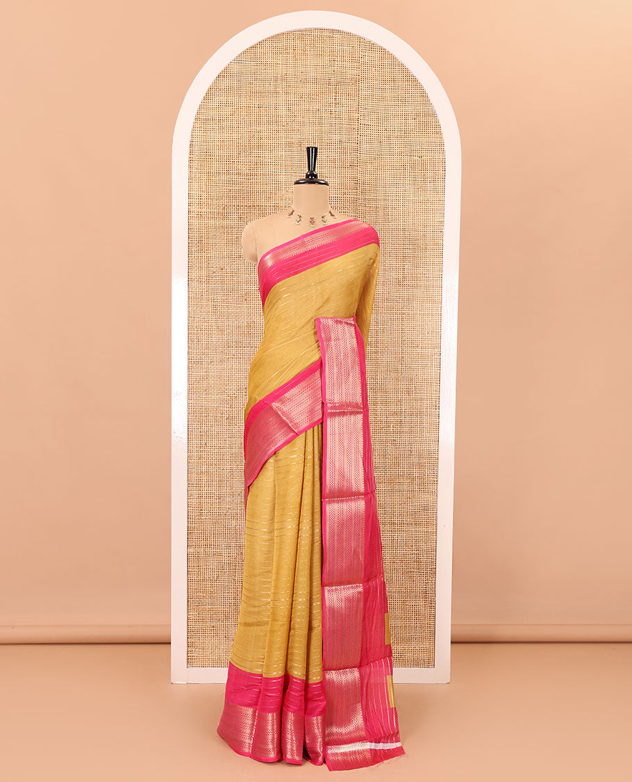 Gold horizontal zari striped moss chiffon saree, contrast traditional zari border, striped pallu, and a contrast zari design blouse