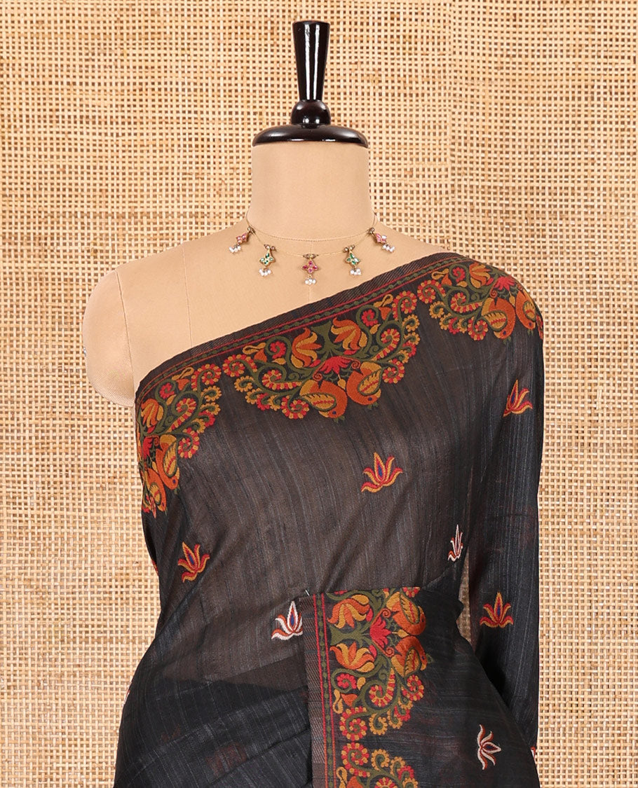 Black lotus motifs thread woven jute cotton, scallop thread woven border, pallu of lotus, peacock and paisley designs along with a plain blouse