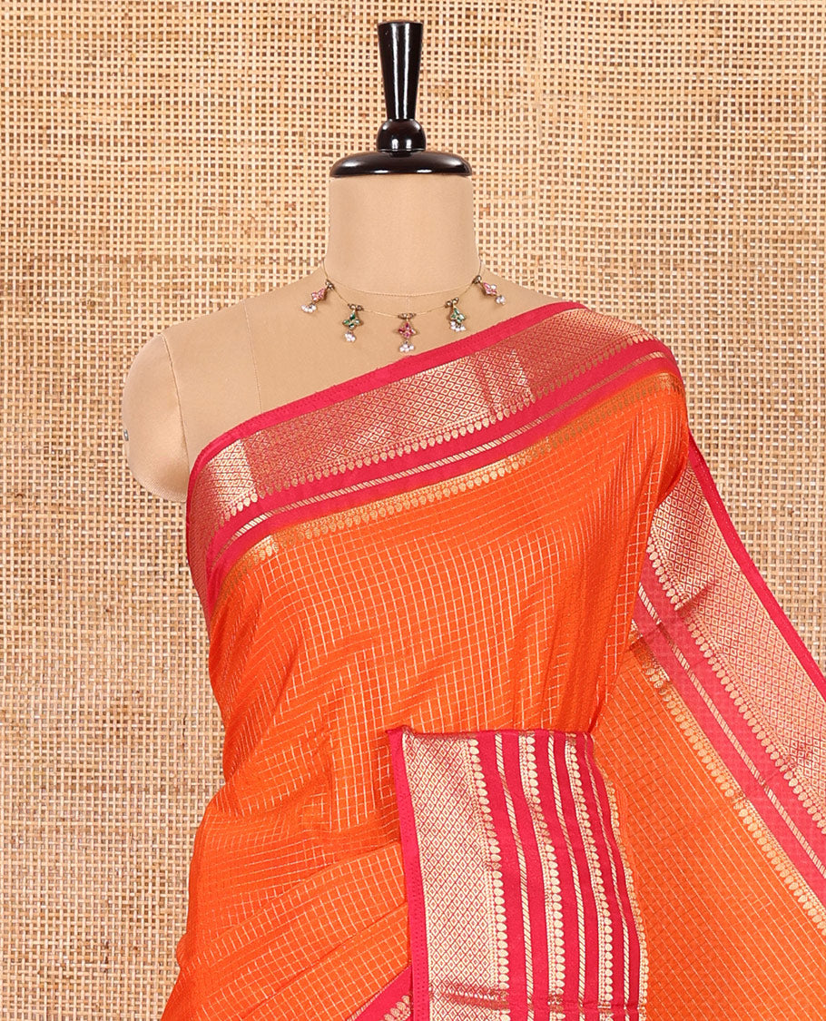 Orange Semi-Mysore Crepe Saree Elegantly Framed with Micro-Checks, Complemented by Contrast Traditional Zari Design Border, Majestically Detailed Pallu of Thilakam Designs, and Paired with a Contrast Blouse