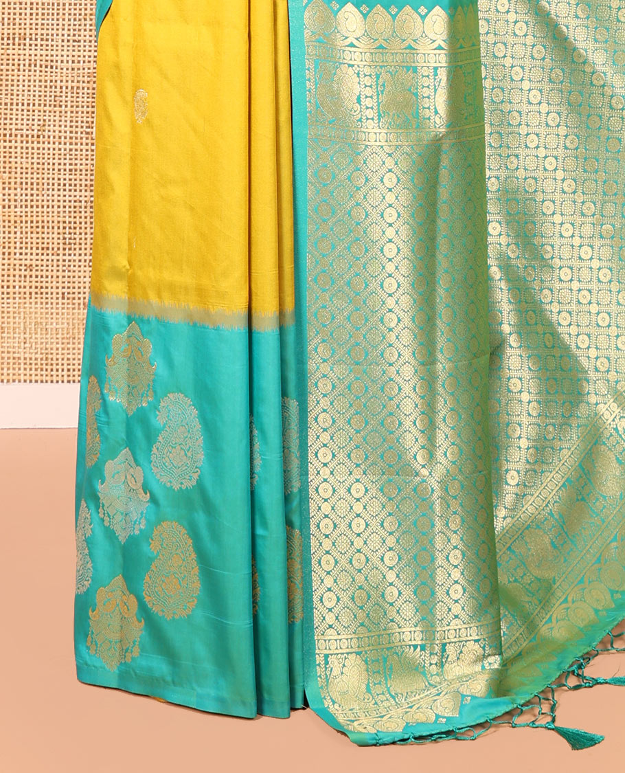Yellow Elite Soft Silk Saree, Decorated with Zari Buttas All Over Its Body, Complemented by Contrast Border Steeped with Zari Buttas, Grand Jaal Design Pallu, and Paired with a Contrast Blouse