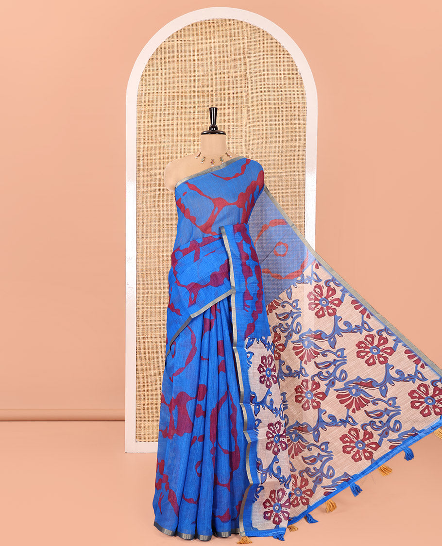 Royal Blue Linen Cotton Saree, Bedecked with Shibori Printed on Its Body, Subtle Piping Border, Pallu of Floral Vine Print, and Paired with a Contrast Floral Vine Printed Blouse