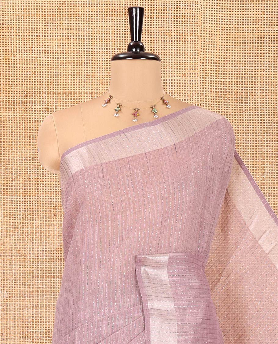 Lavender Linen Zari Cotton Saree, Gleamed Up with Zari Stripes All Over Its Body, a Subtle Zari Border, a Self-Pallu, and Comes Without a Blouse
