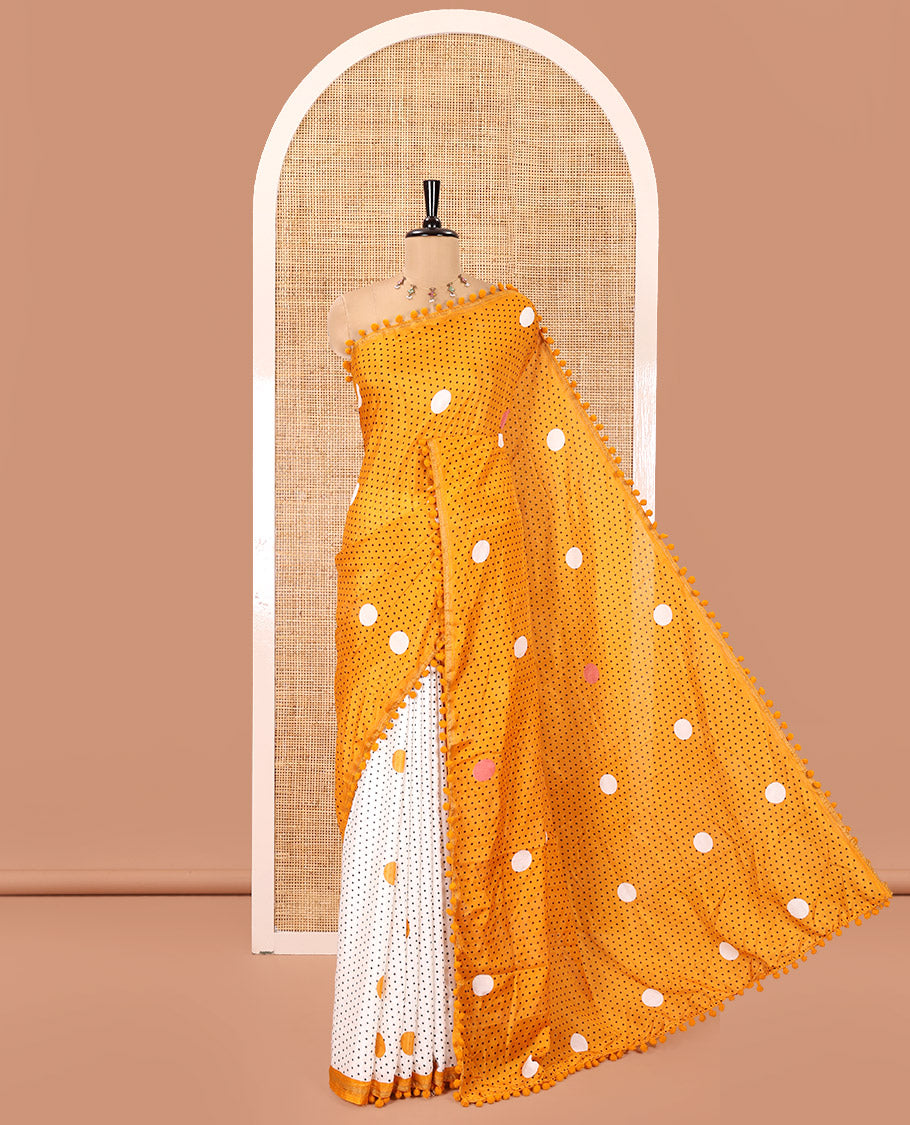 Mustard Chanderi Cotton Saree, Steeped with Small and Big Polka Dots on Its Body, Subtle Pom-Pom Tasseled Border, a Self-Pallu, and Paired with a Contrast Blouse