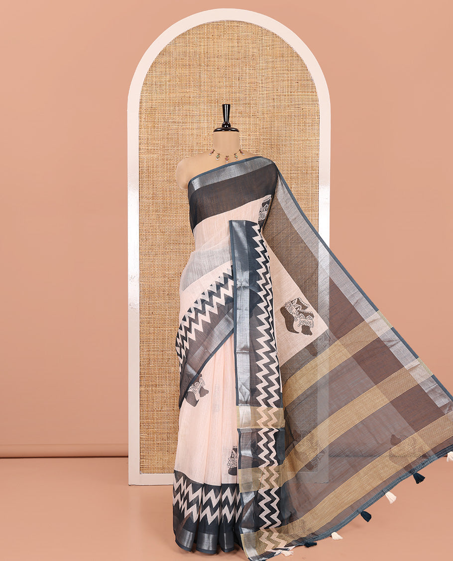Peach Linen Cotton Saree Features a Dancer-Feet-Theme Print, Contrast Border, Striped Pallu, and a Contrast Blouse