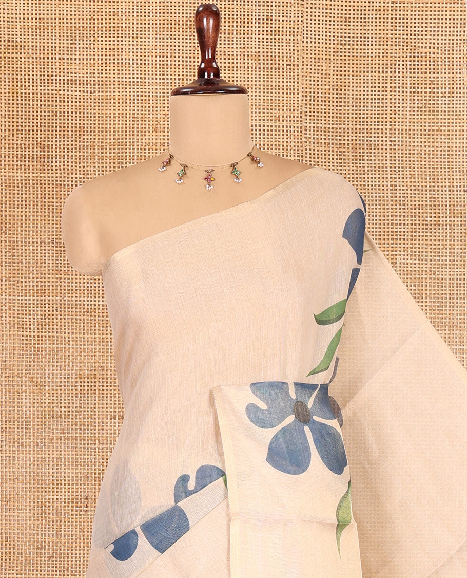 Borderless Cream-Blue Tissue Saree Features Floral Print, a Floral Printed Pallu, and a Contrast Blouse