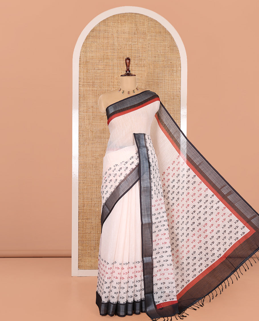 Cream Linen Cotton Saree Artfully Printed with Fish Motifs, a Contrast Border, a Fish-Printed Pallu, and a Contrast Blouse