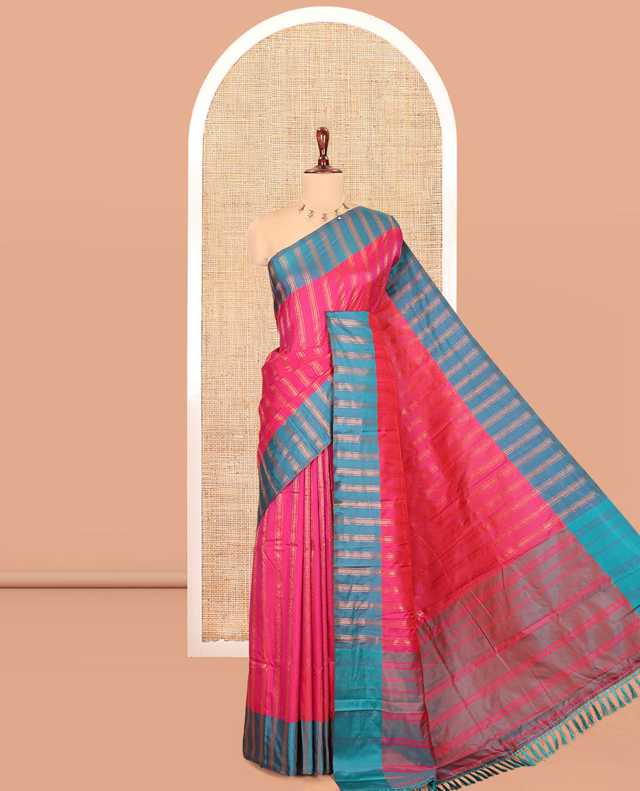 Rani Pink Semi-Soft Silk Saree, Elevated with Chevron Stripes, Complemented by a Contrast Zari Striped Border, and a Contrast Blouse