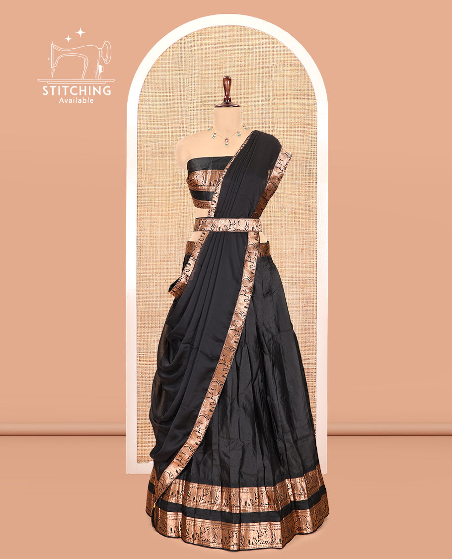Black Semi-Silk Half-Saree Features Plain Skirt, a Rettai Pettu Elephant-Peacock Border, Matching Blouse, and a Dhavani