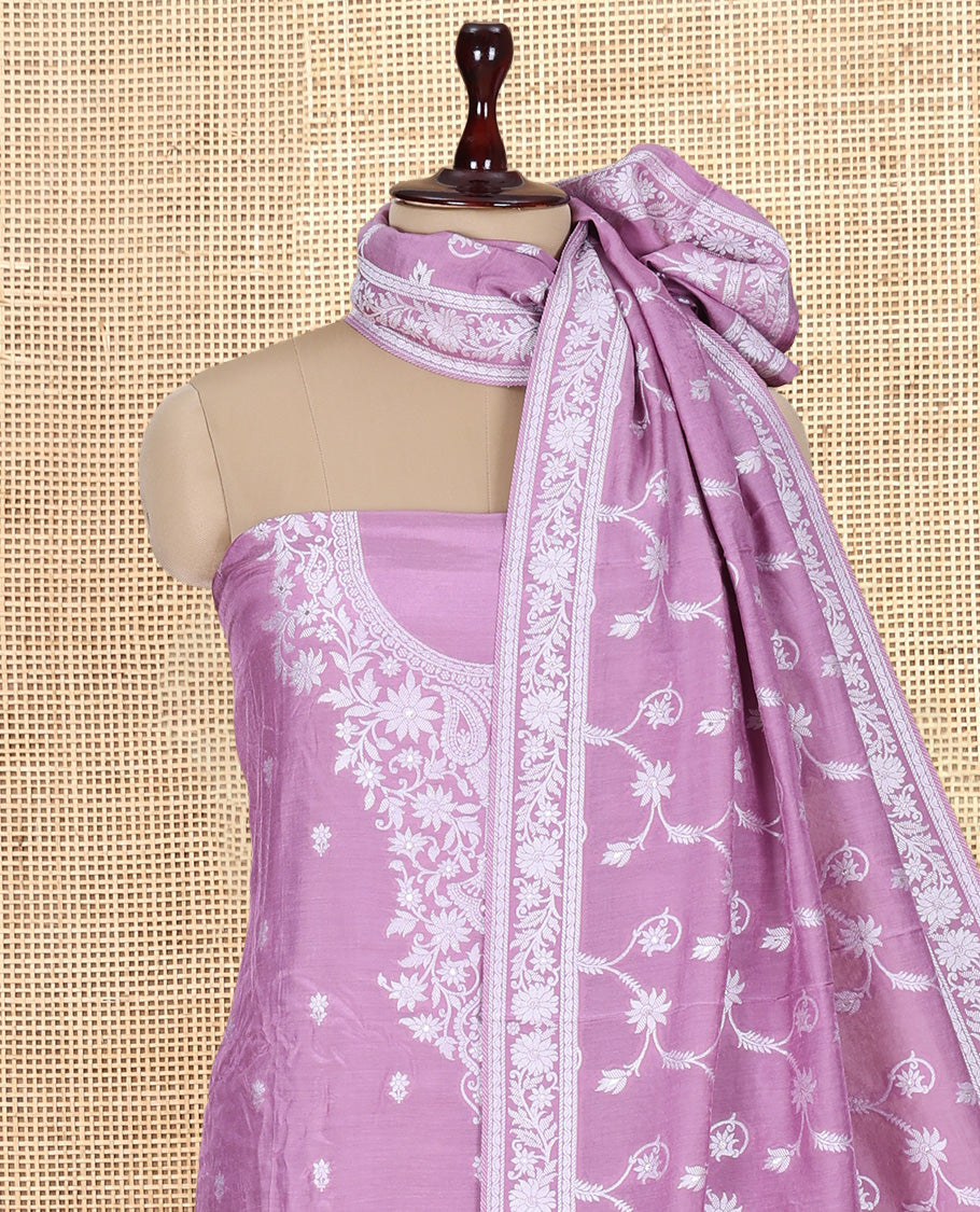Lavender Viscose Muslin Material Churidar Features Buttas Thread Woven Top, a Santoon Bottom, and Floral Jaal Dupatta