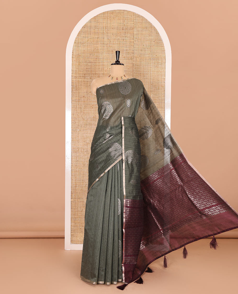 Borderless green neem zari circle motifs fancy tussar saree with contrast diamond-patterned zari-rich pallu, and a contrast striped blouse