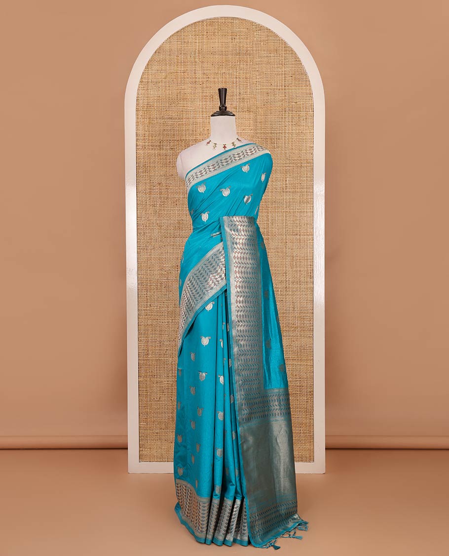 Blue leaf zari buttas dola silk saree, geometric patterned zari border, pallu of geometric pattern & diagonal stripes & plain blouse
