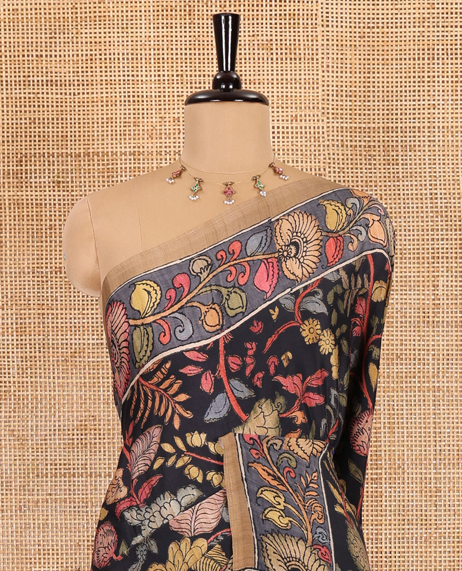 Black kalamkari floral vine printed Italian crepe saree, contrast kalamkari floral creeper printed border, pallu of Pichwai and kalamkari print, and a plain blouse