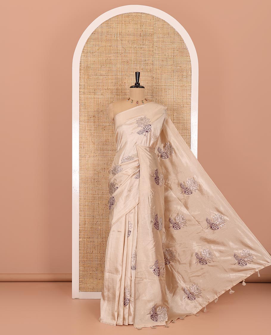 Borderless chikku floral motifs embroidered fancy tussar saree, floral motifs embroidered pallu, and a plain blouse