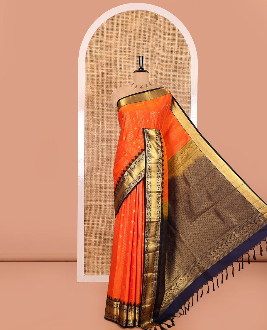 Orange Kanchipuram Budget Silk Saree, Finely Detailed with Zari Designs All Over Its Body, Complemented by a Contrast Temple Border of Floral Creeper Designs, Majestically Detailed Pallu, and Paired with a Contrast Blouse
