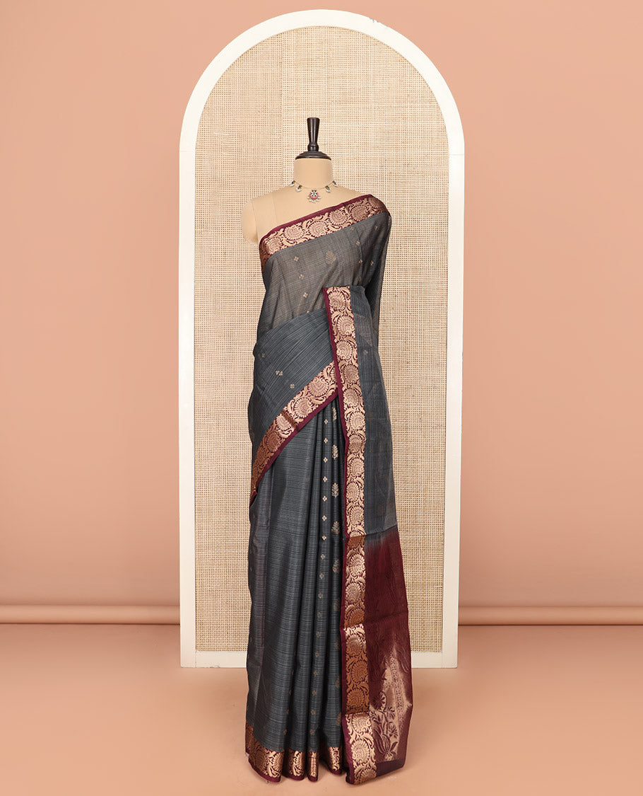 Grey Silk Cotton Saree Beautified with Buttas All Over the Body, Complemented by a Contrast Floral Creeper Zari Border, Featuring a Contrast Pallu of Floral Zari Designs, and Paired with a Contrast Blouse