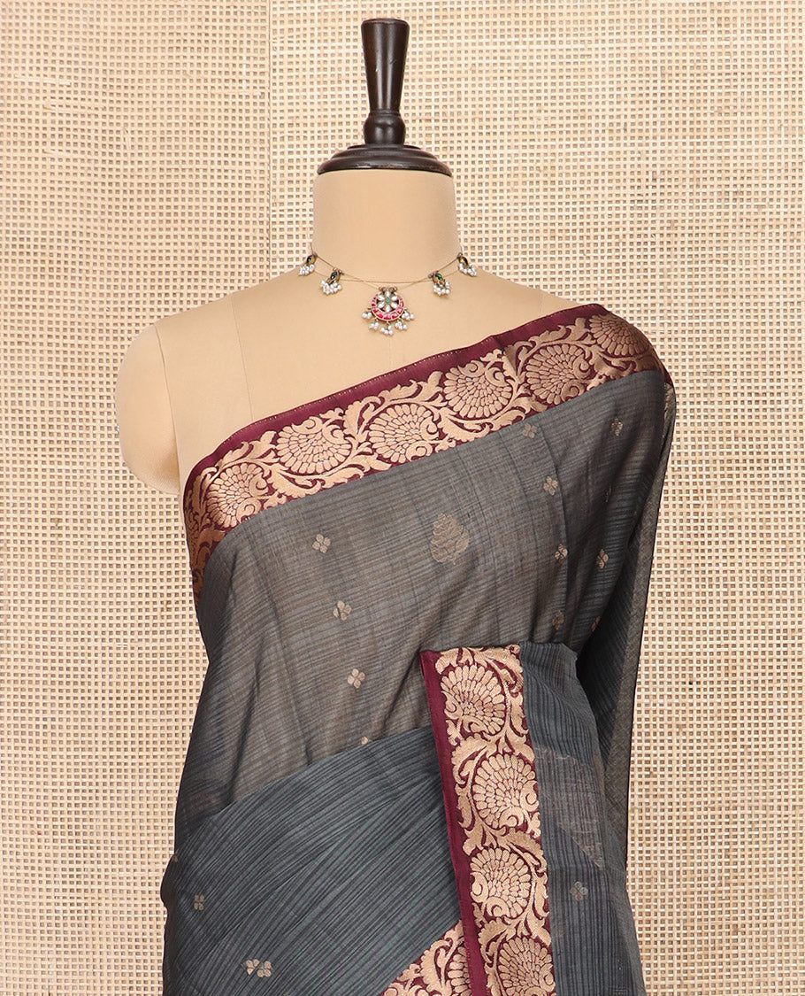 Grey Silk Cotton Saree Beautified with Buttas All Over the Body, Complemented by a Contrast Floral Creeper Zari Border, Featuring a Contrast Pallu of Floral Zari Designs, and Paired with a Contrast Blouse