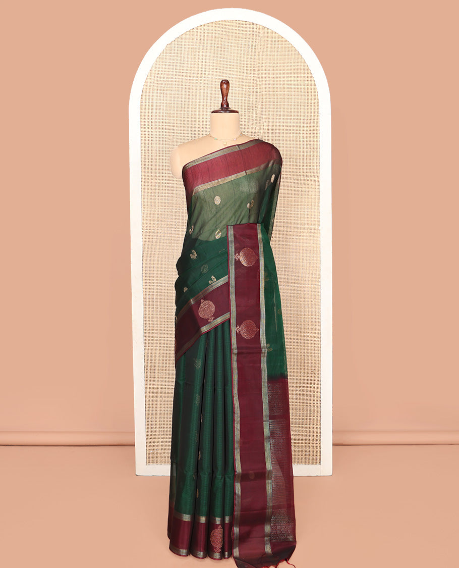 Green Silk Cotton Saree, Artfully Woven with Peacock and Rudraksham Motifs On Its Body, Complemented by Contrast Zari Motifs Woven Border, Geometric Zari Patterned Pallu and Paired with a Contrast Blouse