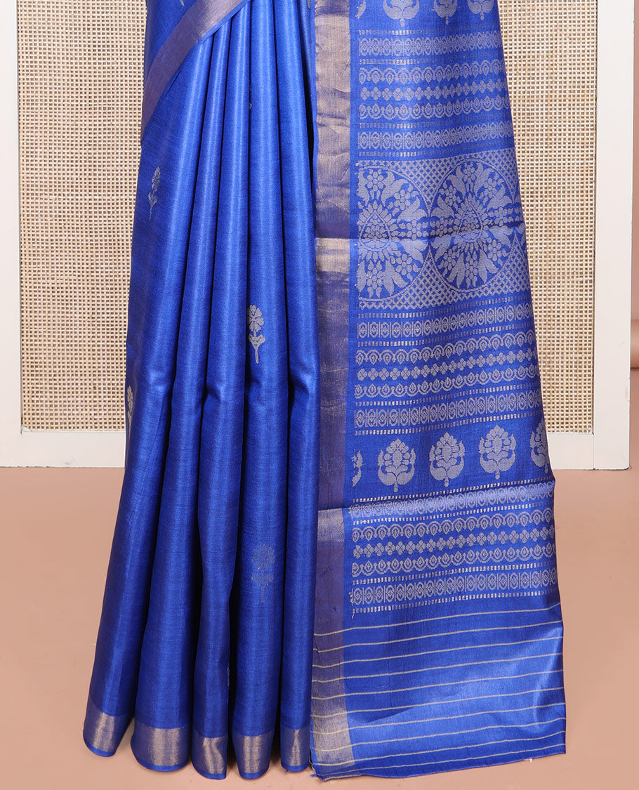 Royal Blue Tussar Silk Saree, Decorated with Floral Buttas All Over Its Body, Subtly Piping Border, Pallu Steeped with Intricate Designs, and Paired with a Matching Blouse