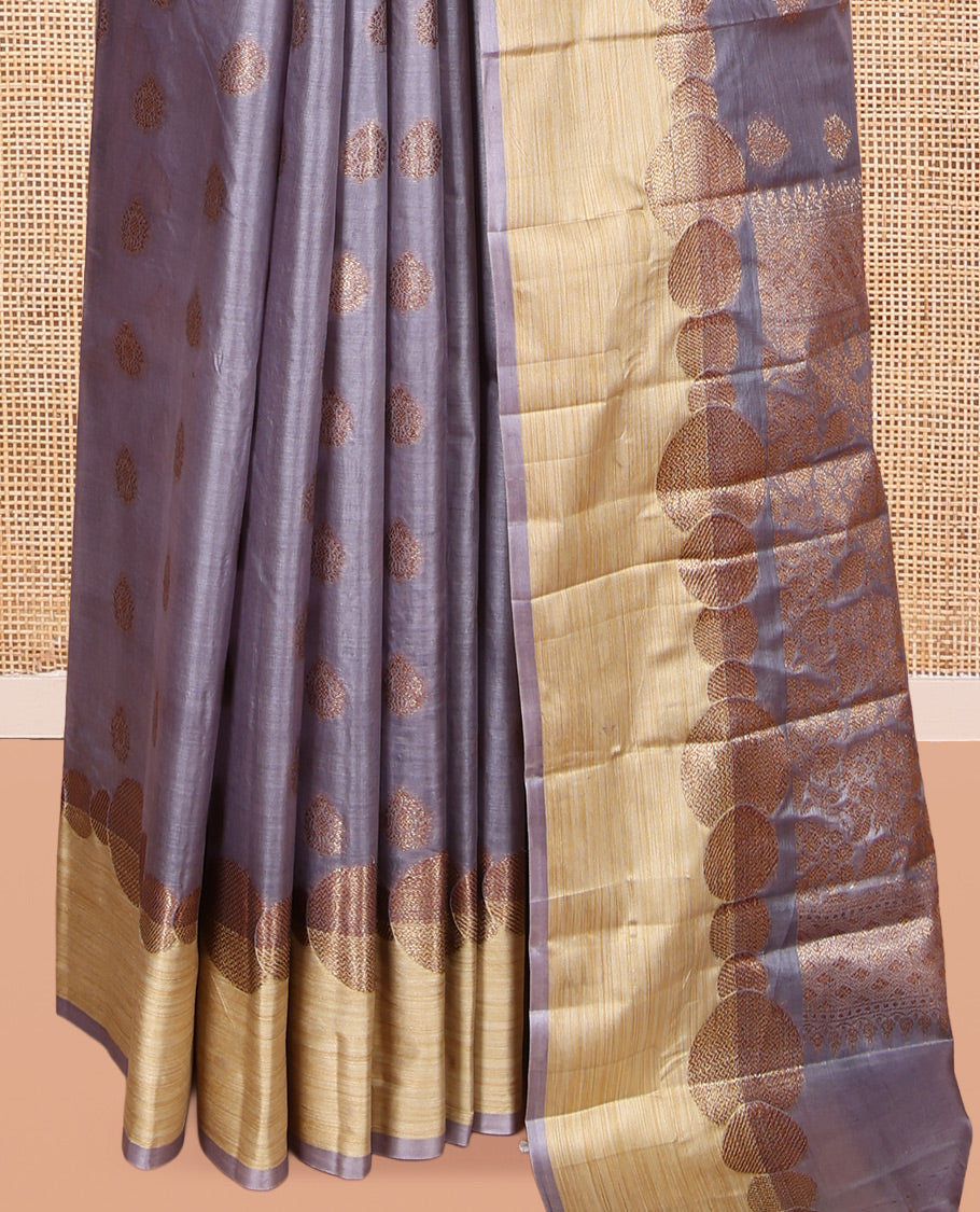 Grey Tusser Silk Saree, Accentuated with Zari Buttas, a Contrast Zari Border, Grandly Decked Up Pallu, and a Matching Blouse