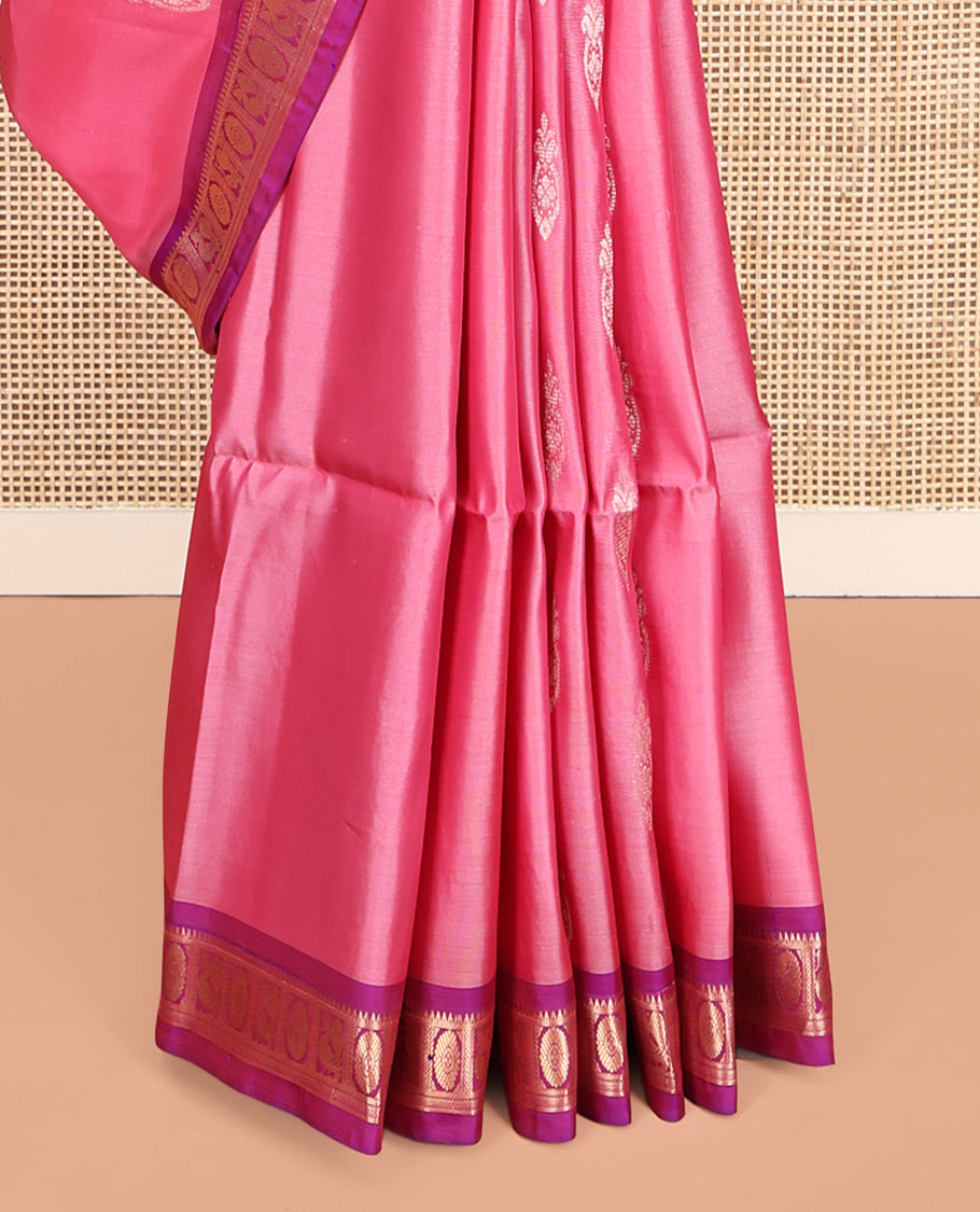 Pink Uppada Silk Saree, Ornamented with Zari Buttas, a Contrast Peacock-Chakram Border, Grand Pallu, and a Contrast Blouse