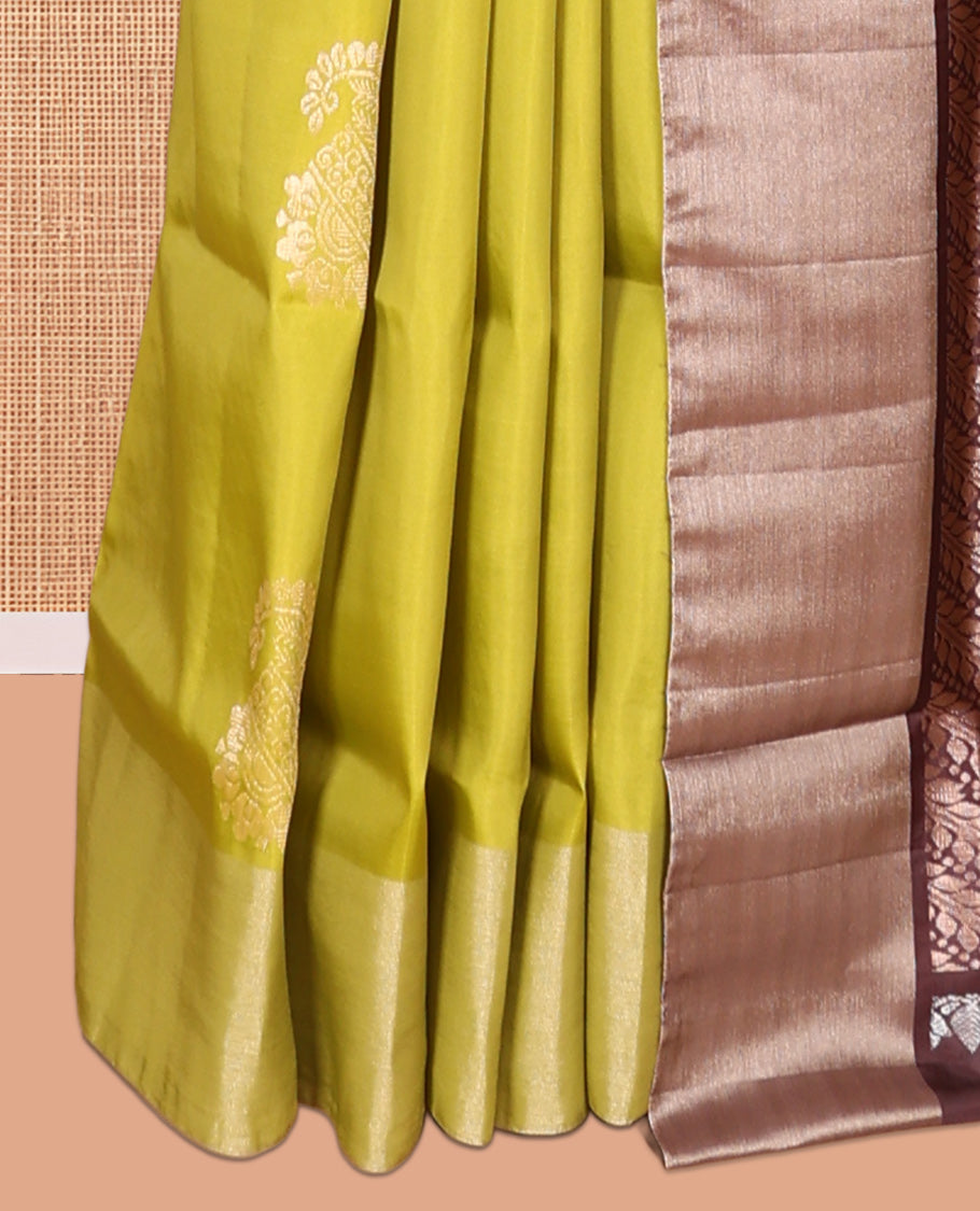 Green Semi Uppada Saree, Embellished with Zari Buttas, a Bavanji Border, Contrast Diagonal Leaf Vine Pallu, and a Contrast Blouse