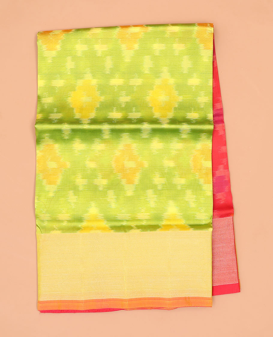 Green ikkat argyle semi-uppada saree with contrast zari border & intricate ikkat design pallu