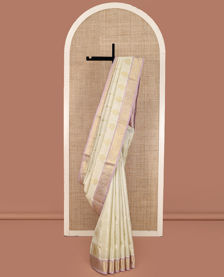 Off-White Venkatagiri Silk Saree, Spotlighted with Zari Buttas All Over Its Body, Complemented by a Contrast Traditional Zari Design Border, Grand Pallu, and Paired with a Contrast Blouse