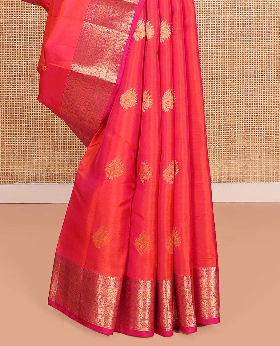 Orange Dual-Tone Vasundhara Lite-Silk Mix Saree, Adorned with Zari Buttas, Complemented by Contrast Border Featuring Thilakam Mokku, Kodi Visiry, Muthu, Laddu Kamalam, and Mayil Designs, Grandly Pallu of Scallop Designs, and Paired with a Contrast Blouse