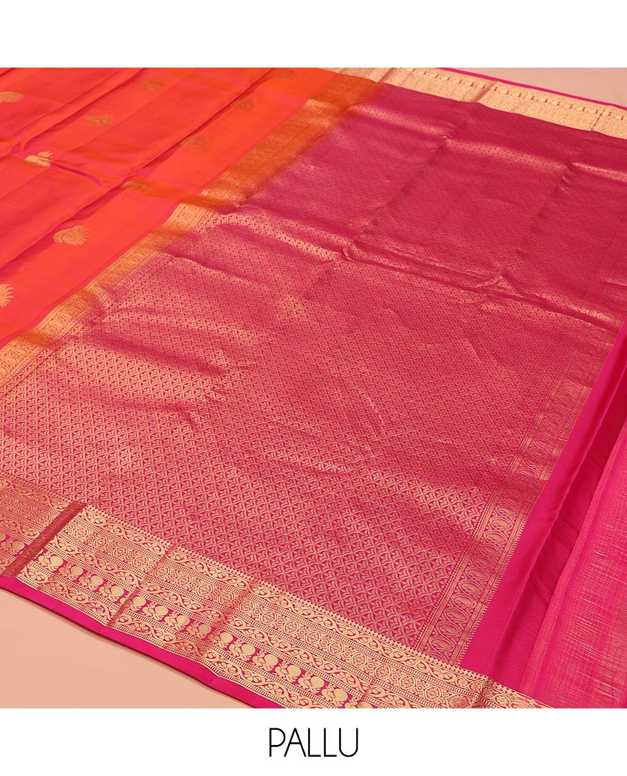 Orange Dual-Tone Vasundhara Lite-Silk Mix Saree, Adorned with Zari Buttas, Complemented by Contrast Border Featuring Thilakam Mokku, Kodi Visiry, Muthu, Laddu Kamalam, and Mayil Designs, Grandly Pallu of Scallop Designs, and Paired with a Contrast Blouse