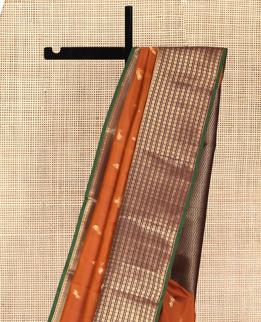 Orange Vasundhara Lite Silk Mix Saree, Graced with Zari Buttas on Its Body, Complemented by a Contrast Border of Rekku, Kathir, Rudraksham, Ara Maadam, and Mayil Kann Designs, Geometric Textured Pallu, and Paired with a Contrast Blouse