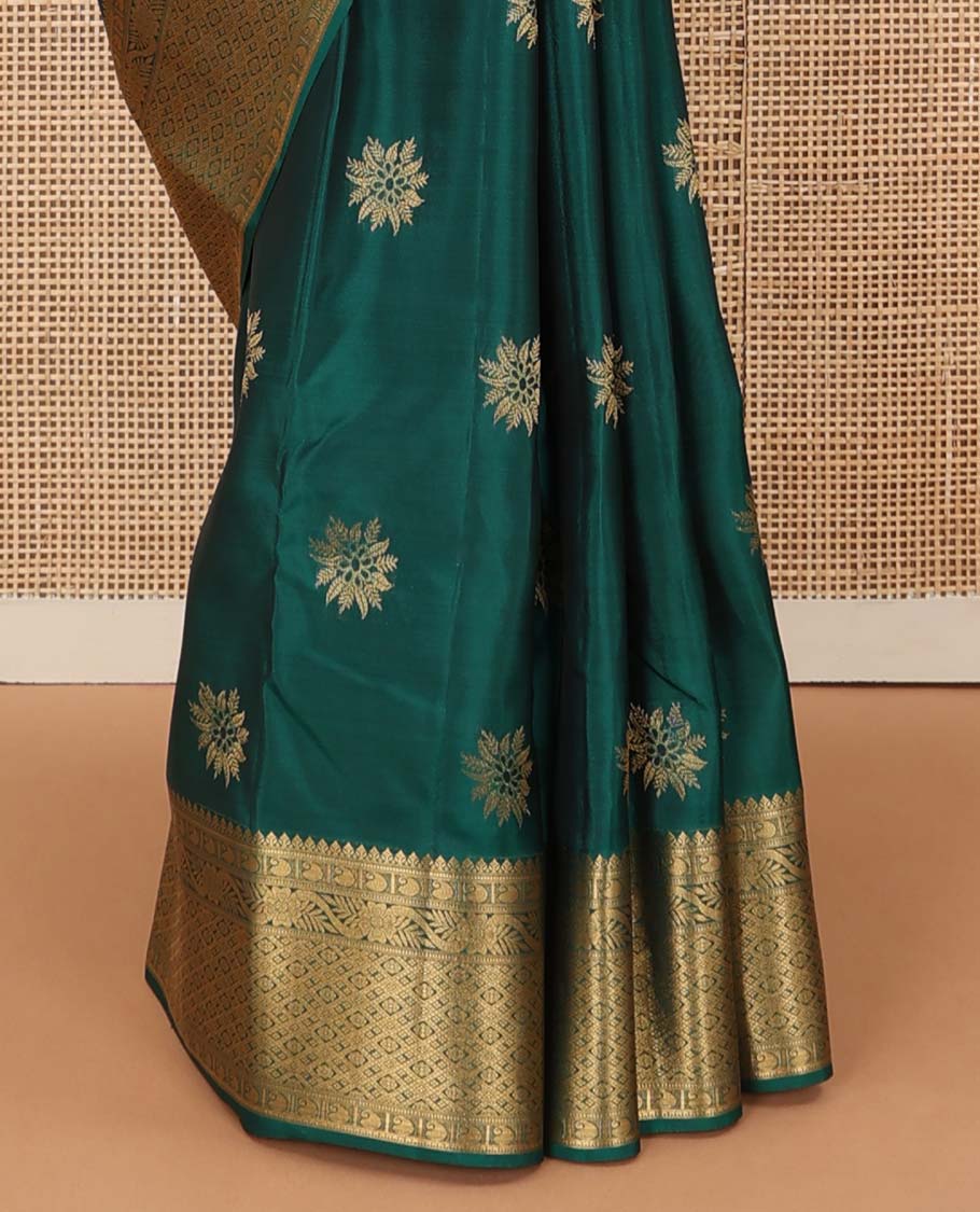 Green floral zari buttas Vasundhara silk mix saree, zari border of thilakam, manga, kodi visiry, and jaal designs, and intricate pallu