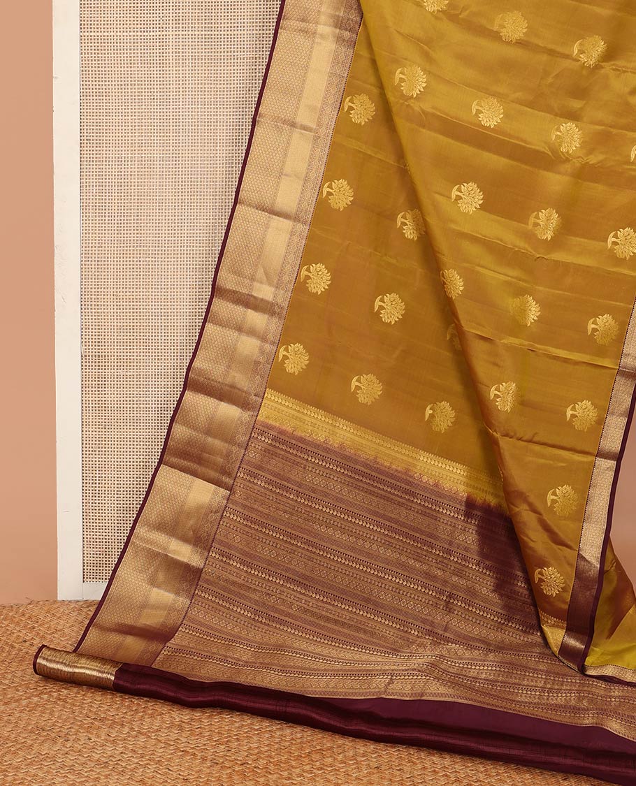 Green zari buttas Vasundhara silk mix saree, contrast border, and pallu steeped with traditional zari designs
