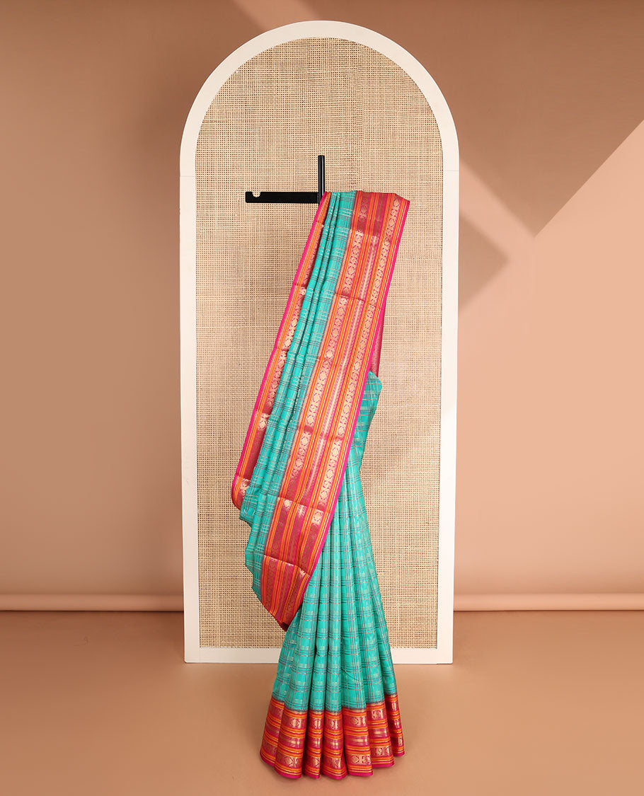 Green checked vasundhara elite silk saree with contrast traditional zari design border & intricate jaal design pallu