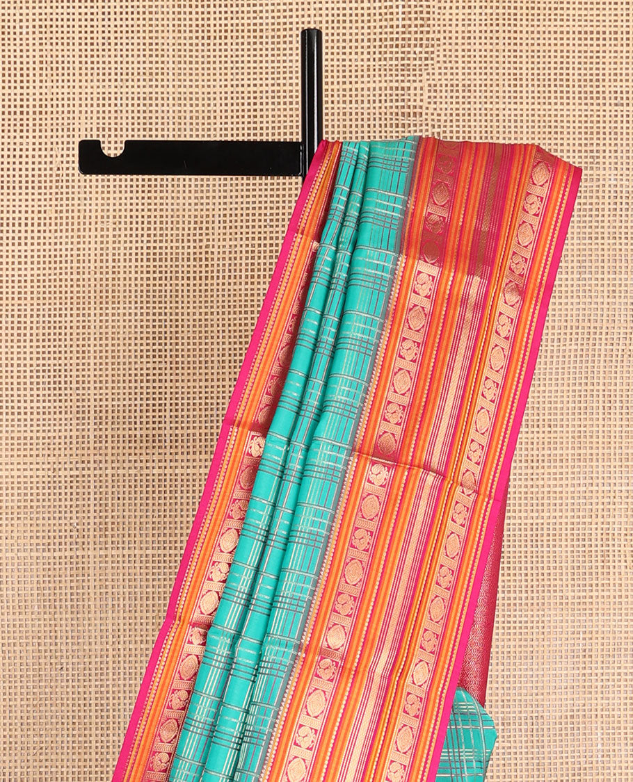 Green checked vasundhara elite silk saree with contrast traditional zari design border & intricate jaal design pallu