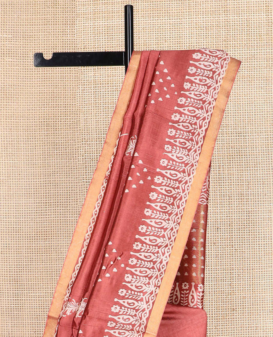 Terracotta red feather motifs printed banana pith saree, zari with print work border, and printed pallu