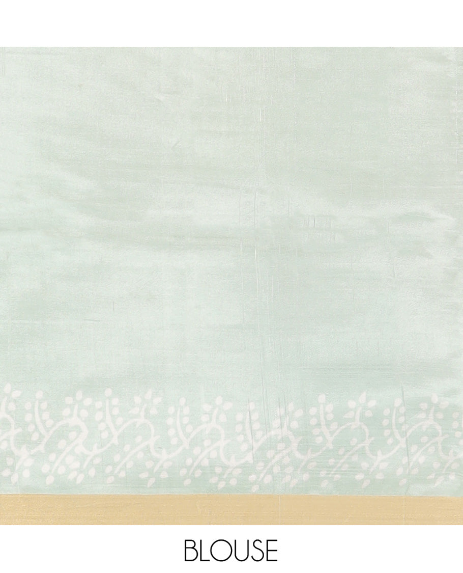 Pastel Green Banana Pith Saree Sparsely Sparkled with Intricate Motifs Printed All Over Its Body, Zari Bavanji Border, Pallu of Print and Zari Work, and Paired with a Matching Blouse