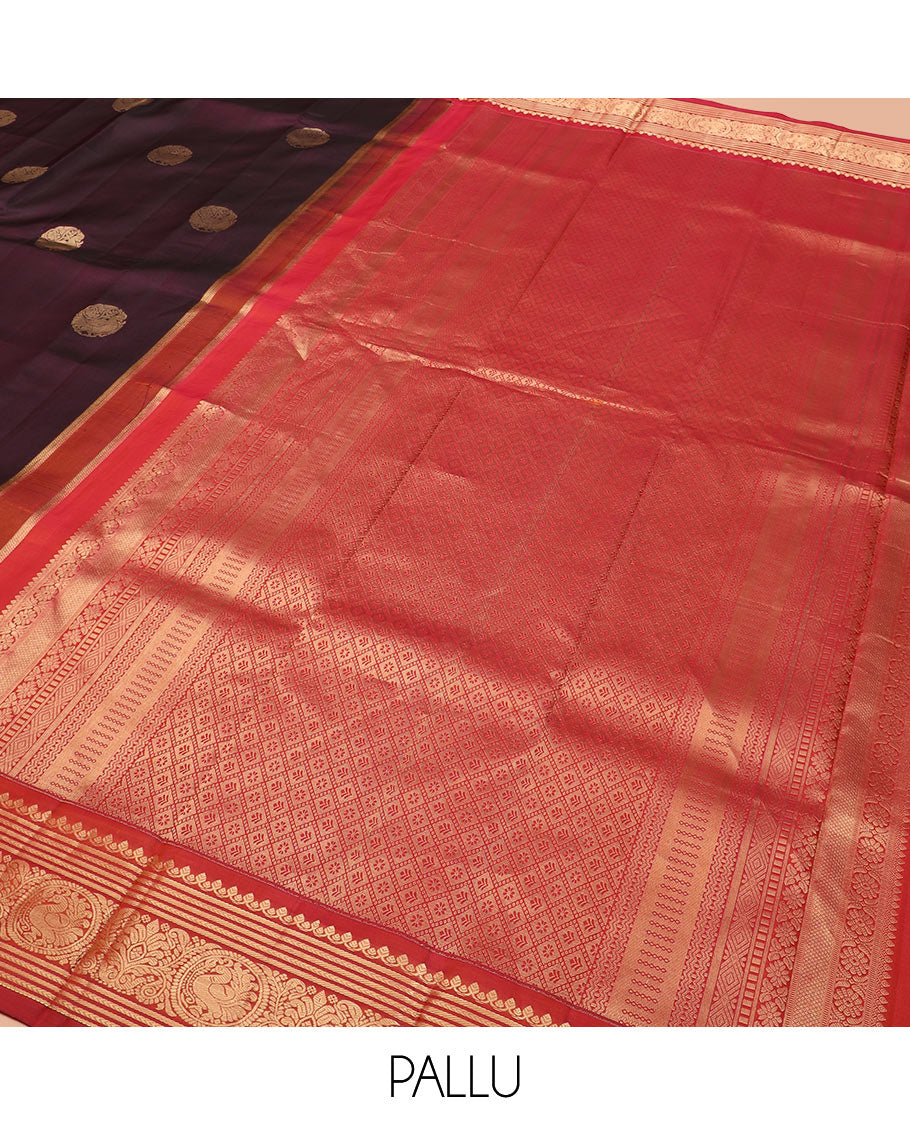 Purple Vasundhara Silk Saree Enthralled with Round Mayil Buttas, Highlighted with a Contrast Border of Thilakam Mokku, Kathir, Banaras, and Mayil Designs, Pallu Decorated with Jaal Design, and Paired with a Contrast Blouse