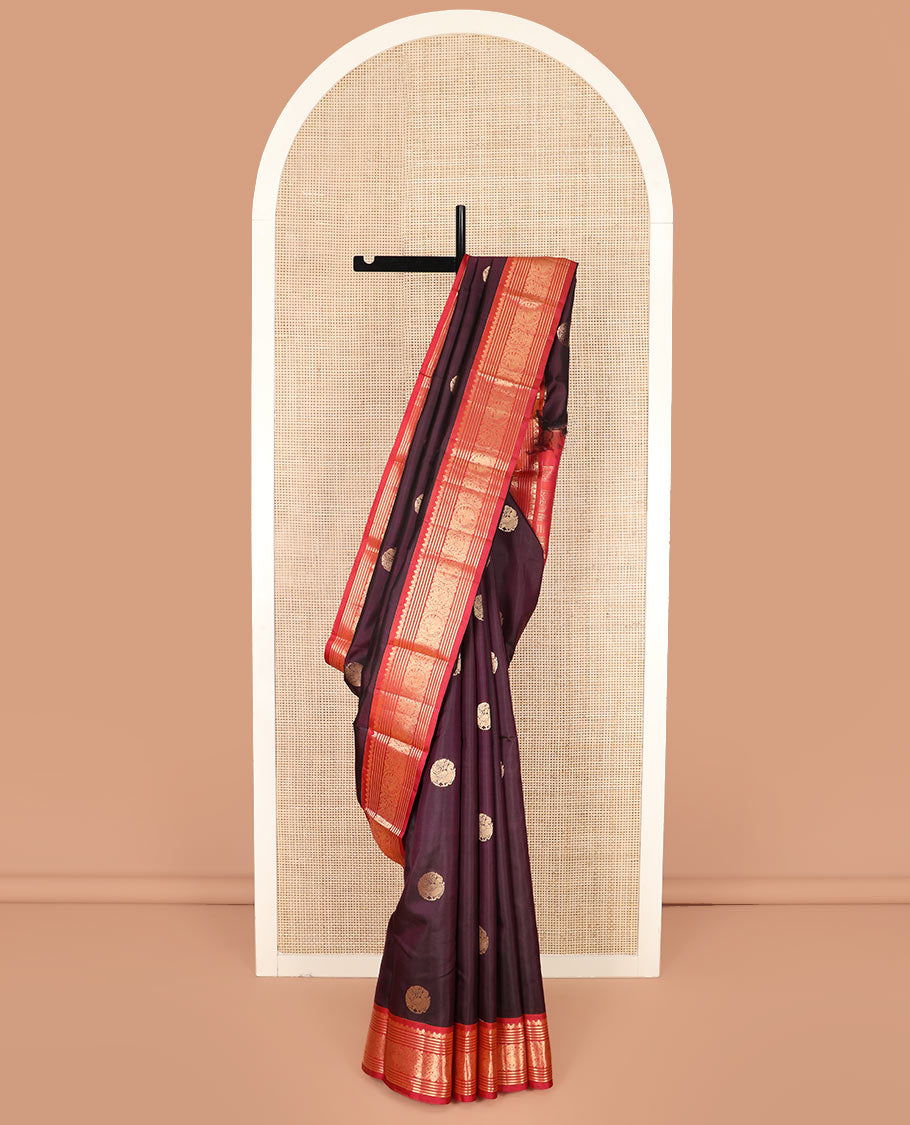 Purple Vasundhara Silk Saree Enthralled with Round Mayil Buttas, Highlighted with a Contrast Border of Thilakam Mokku, Kathir, Banaras, and Mayil Designs, Pallu Decorated with Jaal Design, and Paired with a Contrast Blouse