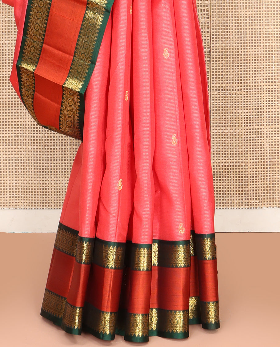 Pink Vasundhara Silk Saree, Subtly Woven with Stripes and Buttas All Over Its Body Complemented by Contrast Rettai Pettu Border of Thilakam, Banaras, Muthu, and Laddu Kamalam Designs, Grand Jaal Pallu and Paired with a Contrast Blouse