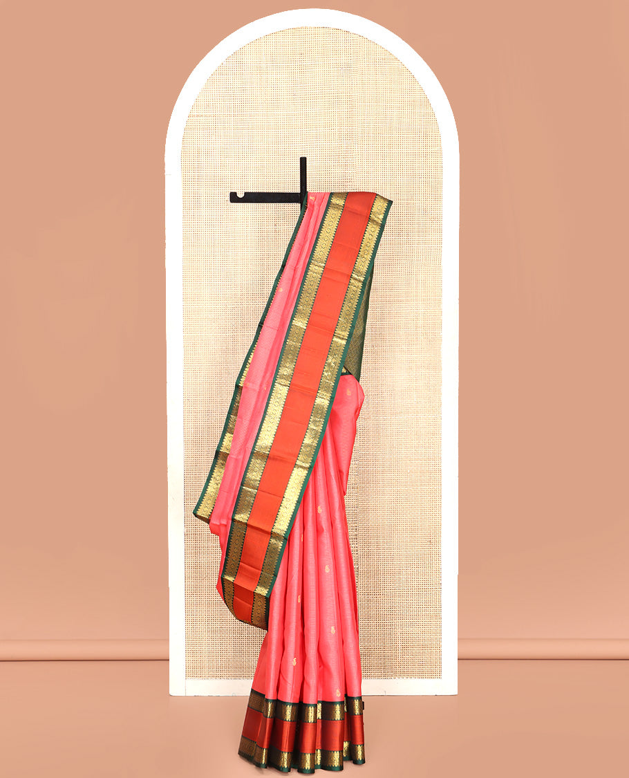 Pink Vasundhara Silk Saree, Subtly Woven with Stripes and Buttas All Over Its Body Complemented by Contrast Rettai Pettu Border of Thilakam, Banaras, Muthu, and Laddu Kamalam Designs, Grand Jaal Pallu and Paired with a Contrast Blouse