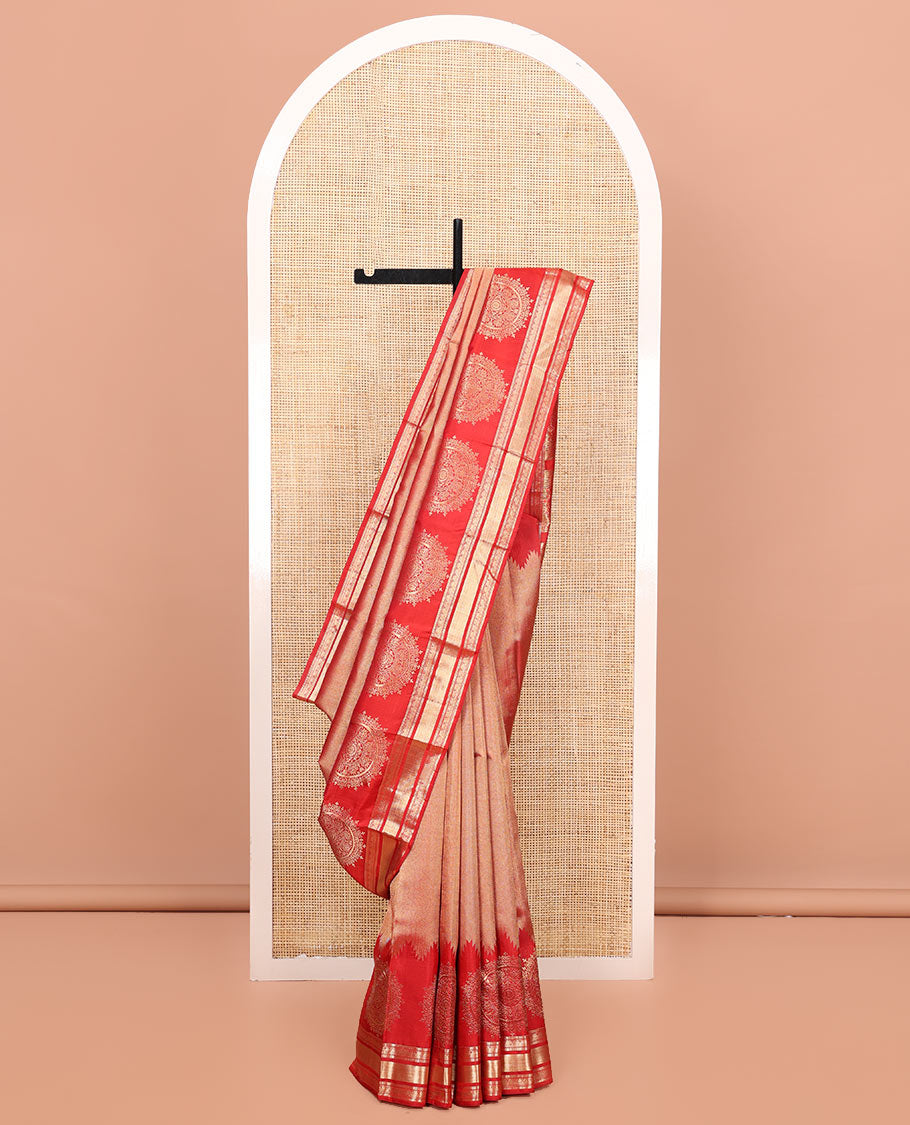 Red Kanchipuram Wedding Silk Saree, Gleamed Up with Zari and Chakram Designs on Its Body, Highlighted by a Zari Border of Muthu, Kamalam, and Vanki Designs, Intricately Designed Pallu, and Paired with a Matching Blouse
