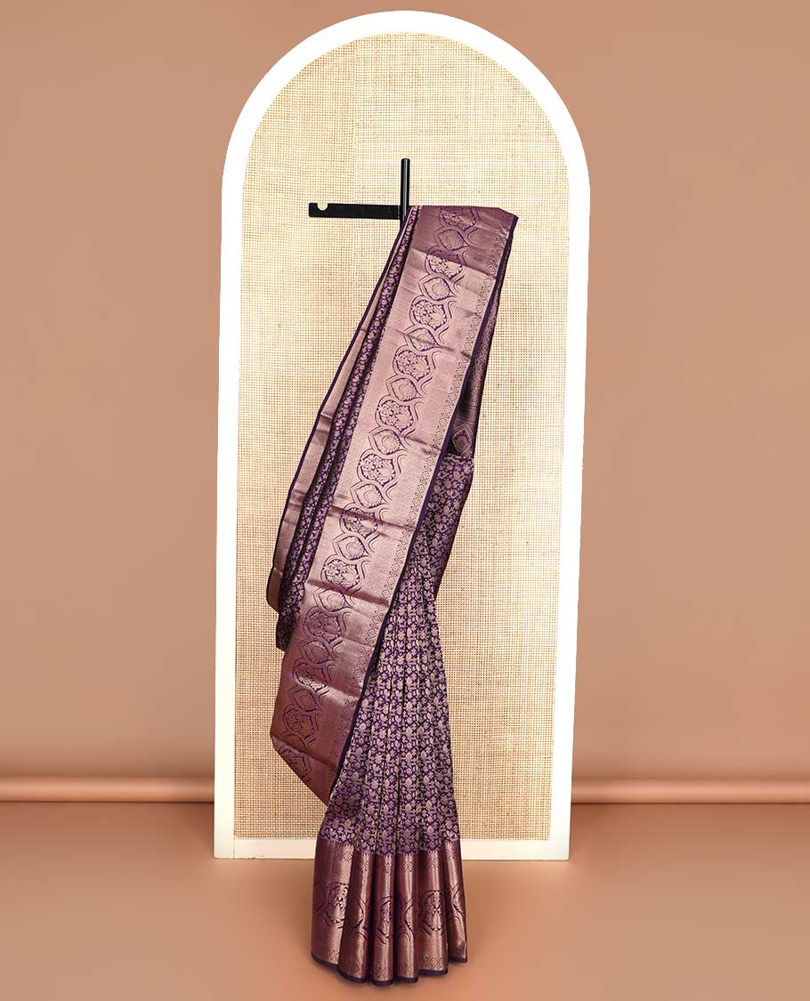 Purple jacquard wedding silk saree, zari border of thilakam mokku, muthu, diamond, jaal, and floral designs, and intricate pallu