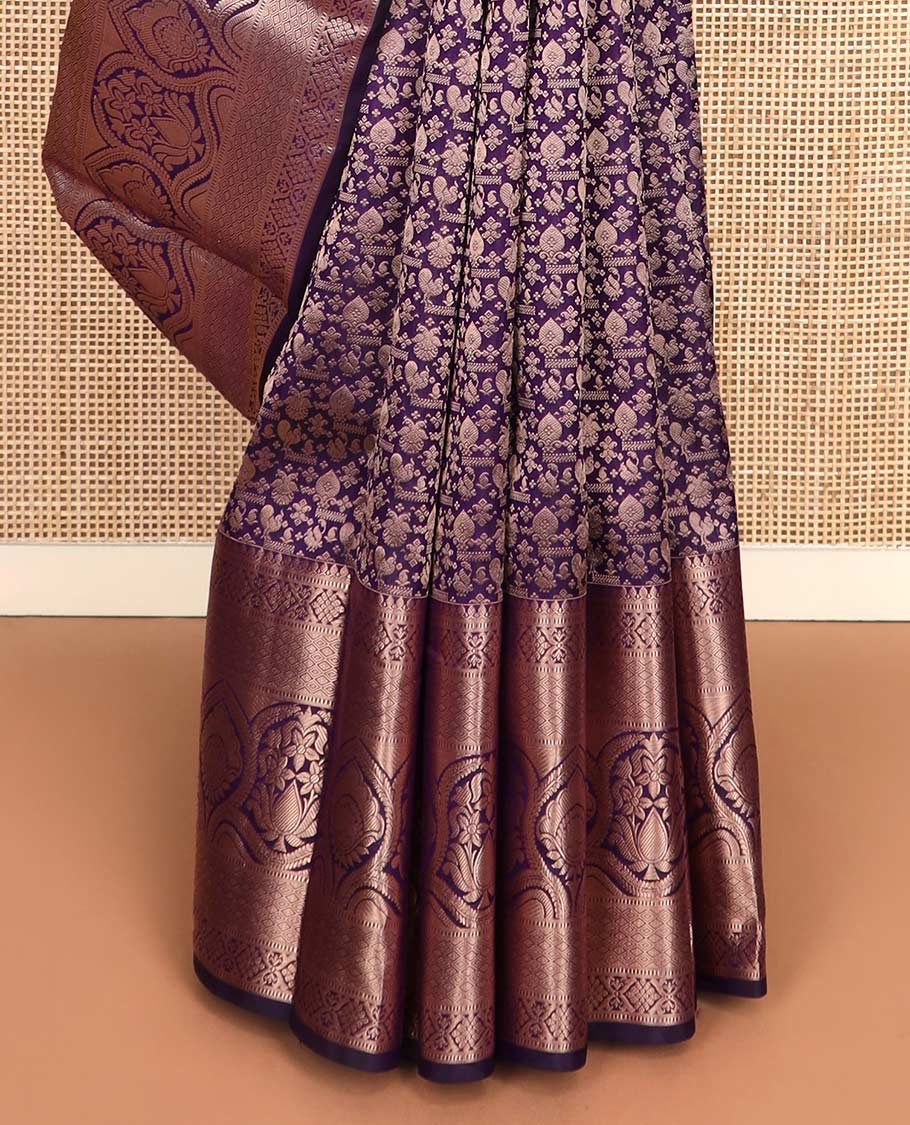 Purple jacquard wedding silk saree, zari border of thilakam mokku, muthu, diamond, jaal, and floral designs, and intricate pallu