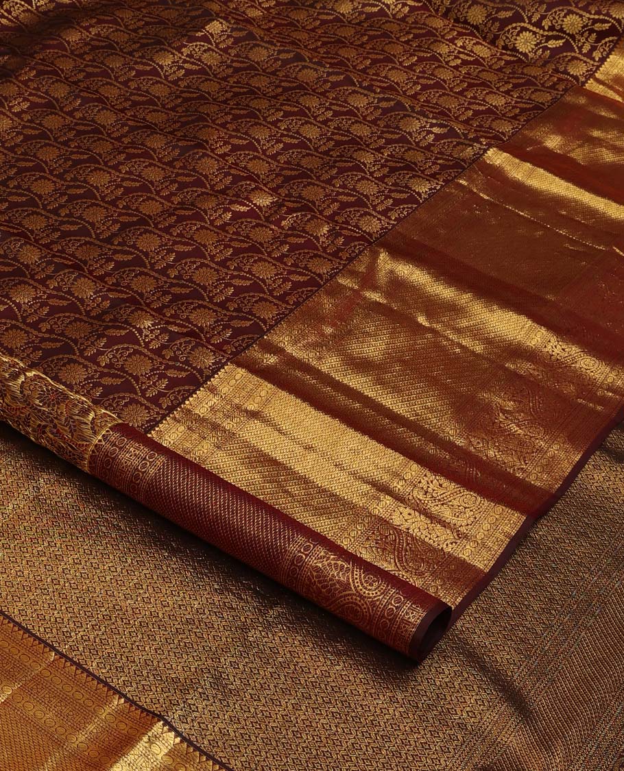 Brown jacquard wedding silk saree, traditional zari design steeped border, and zari-rich intricate pallu