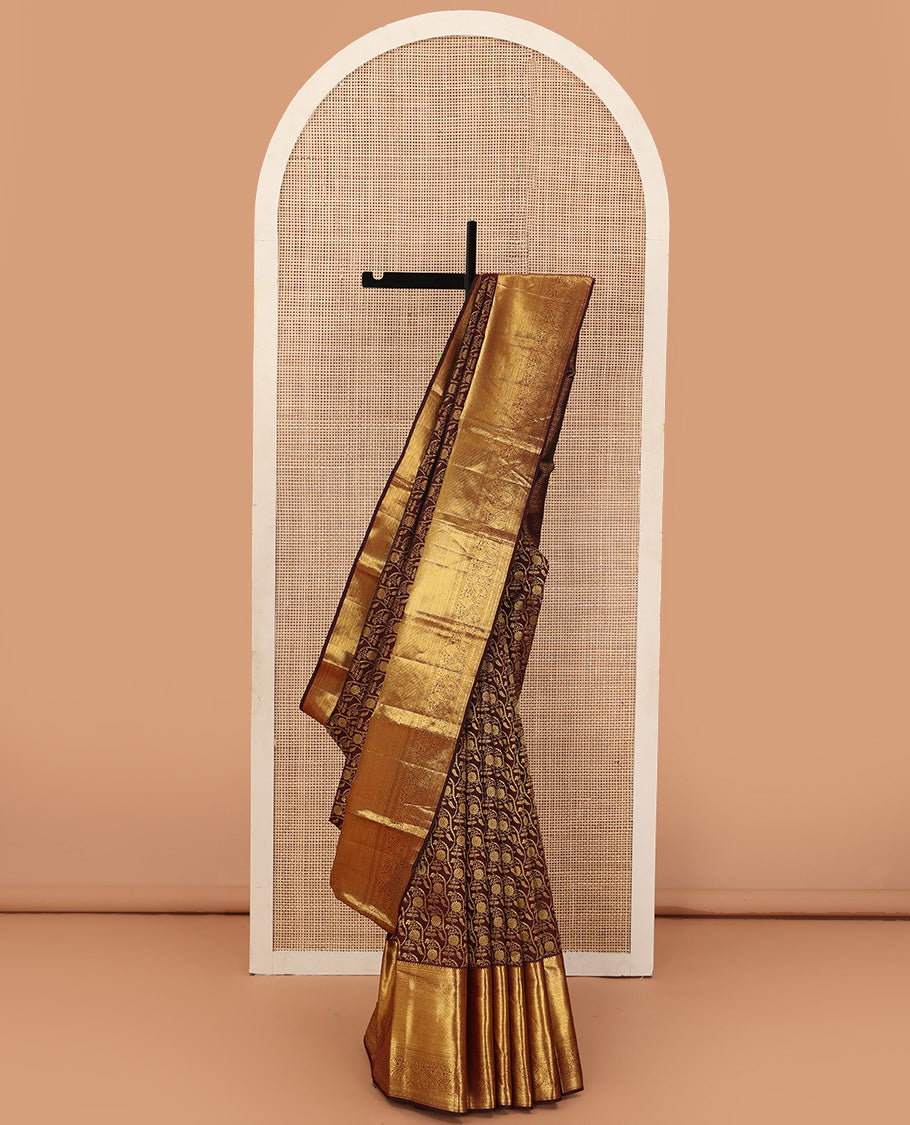 Brown jacquard wedding silk saree, traditional zari design steeped border, and zari-rich intricate pallu