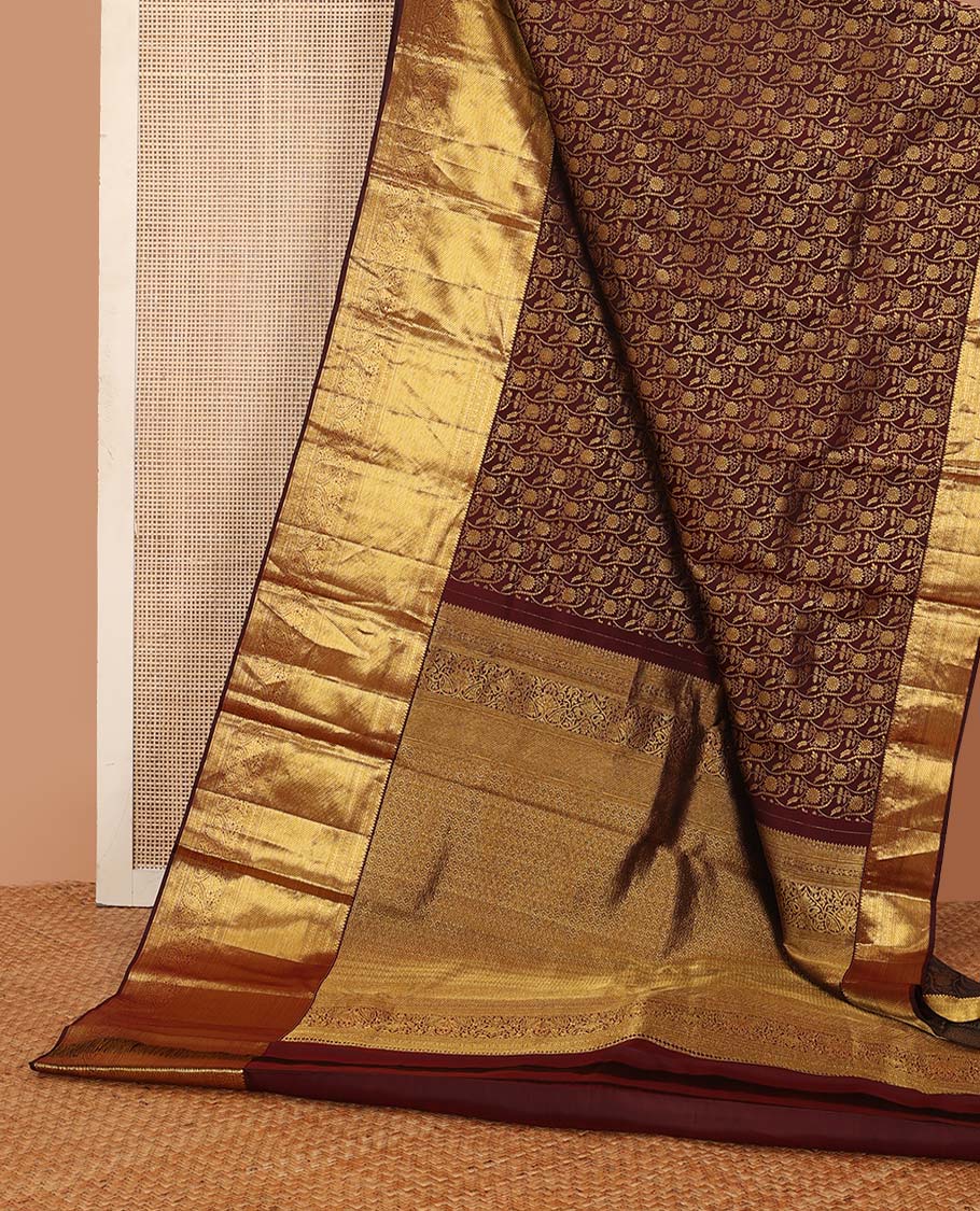 Brown jacquard wedding silk saree, traditional zari design steeped border, and zari-rich intricate pallu