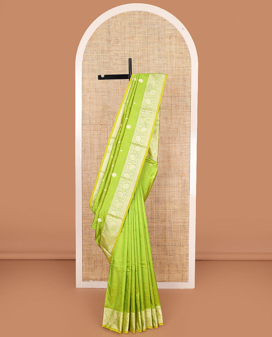 Parrot green buttas banarasi kathan silk saree, floral creeper border, and pallu of paisley jaal design